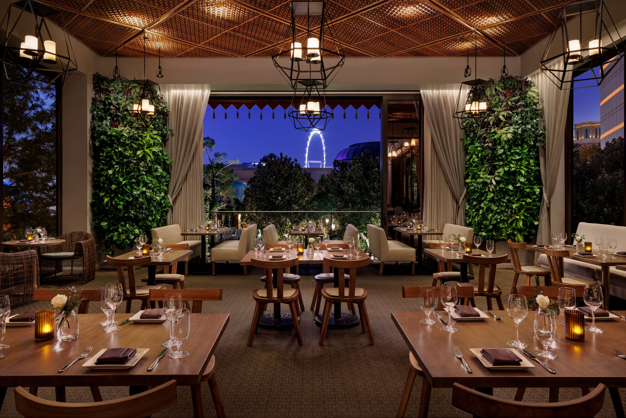 The Garden Room set for an evening event at twilight